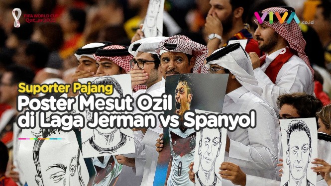 Poster Ozil dan Pose Tutup Mulut di Laga Jerman vs Spanyol