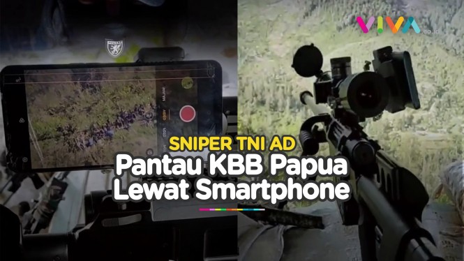 Sniper TNI Pantau KKB Lewat Ponsel yang Tersambung Teleskop